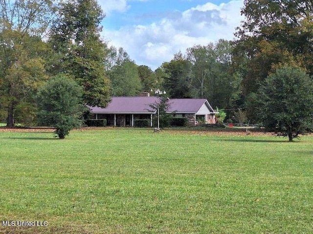 view of front of house with a front yard