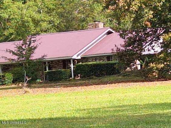 exterior space featuring a front lawn