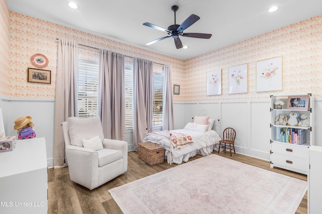 bedroom featuring wood-type flooring and ceiling fan