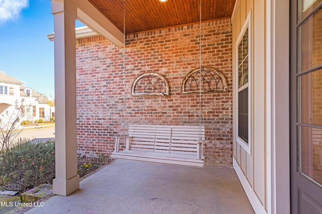 view of patio featuring a porch