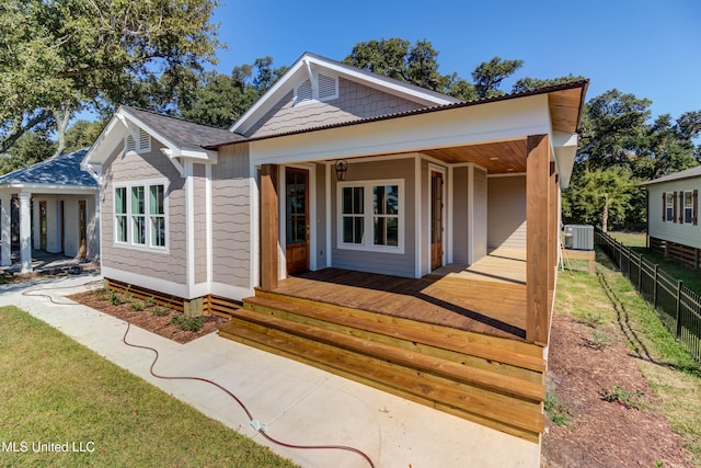 bungalow-style home with central AC