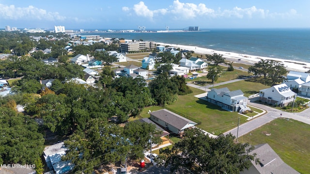 aerial view featuring a water view and a view of the beach