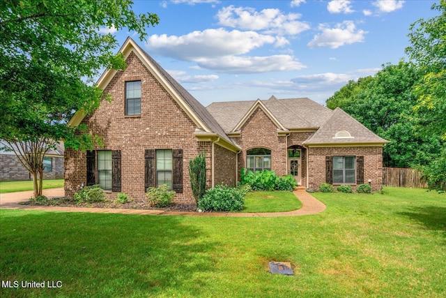 6865 Payne Ln, Olive Branch, MS 38654 - view of front facade with brick siding and a shingled roof