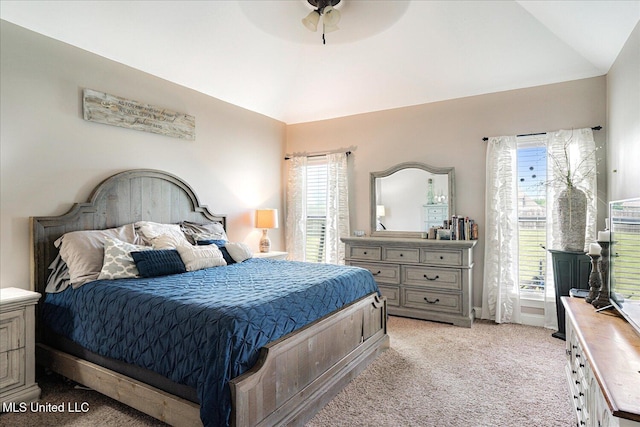 6865 Payne Ln, Olive Branch, MS 38654 - bedroom featuring light colored carpet, lofted ceiling, multiple windows, and a ceiling fan