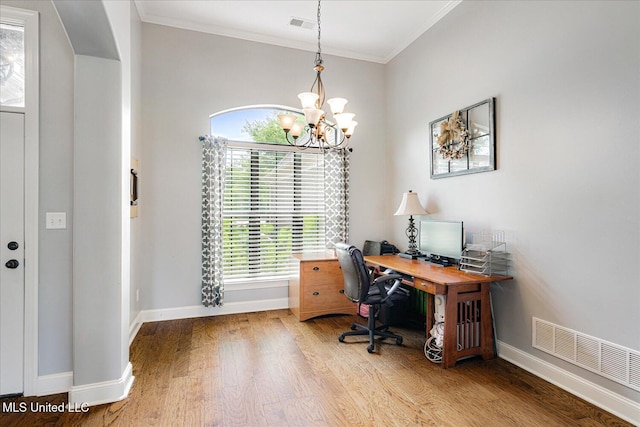 6865 Payne Ln, Olive Branch, MS 38654 - office space with crown molding, light wood finished floors, and a chandelier