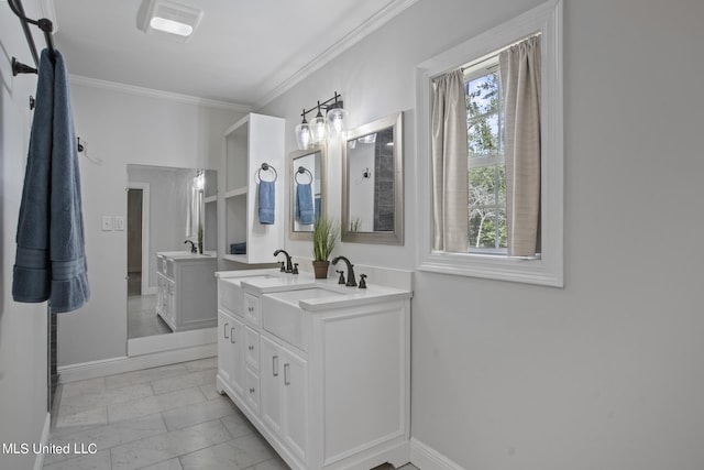 bathroom with vanity and ornamental molding