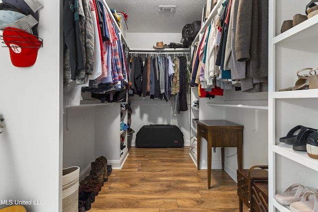 14463 Aerie Rd, Gulfport, MS 39503 - spacious closet with wood finished floors