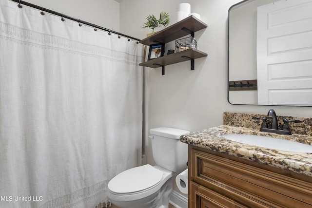 14463 Aerie Rd, Gulfport, MS 39503 - bathroom with toilet, vanity, and a shower with shower curtain