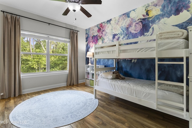 14463 Aerie Rd, Gulfport, MS 39503 - bedroom with baseboards, wood finished floors, and ceiling fan