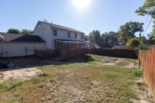 view of yard featuring a sunroom