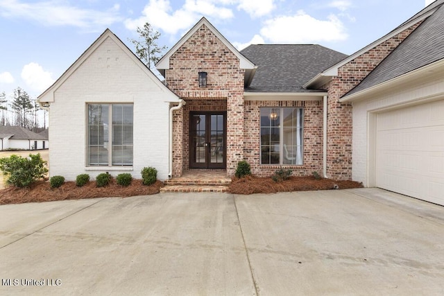 view of exterior entry featuring a garage