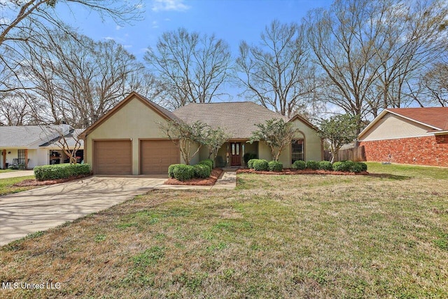 view of front of home featuring stucco siding, a front yard, concrete driveway, and an attached garage