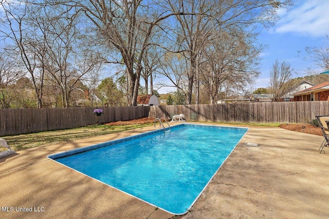 view of swimming pool with a patio, a fenced backyard, and a fenced in pool