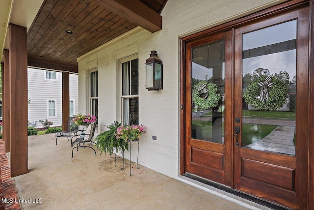 233 Arbor Trl, Brandon, MS 39047 - view of exterior entry with french doors and a porch