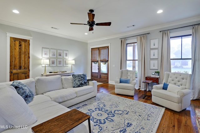 233 Arbor Trl, Brandon, MS 39047 - living area featuring ornamental molding, visible vents, ceiling fan, and a healthy amount of sunlight