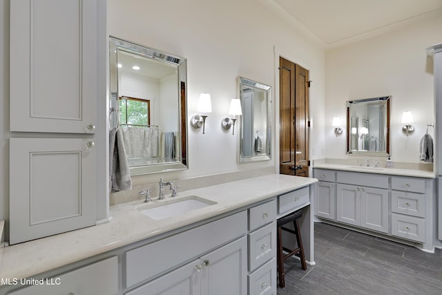 233 Arbor Trl, Brandon, MS 39047 - full bath with two vanities, wood finished floors, and a sink