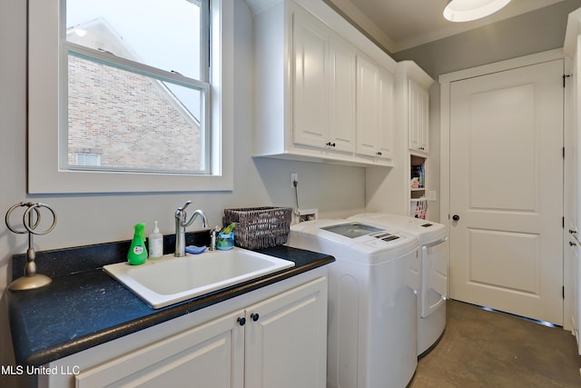 233 Arbor Trl, Brandon, MS 39047 - laundry room featuring washer and dryer, a sink, and cabinet space