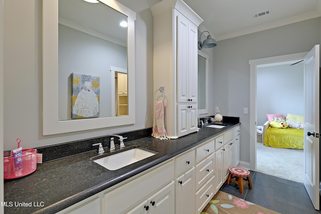233 Arbor Trl, Brandon, MS 39047 - bathroom featuring visible vents, crown molding, double vanity, and a sink