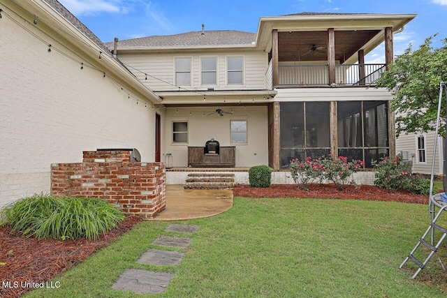 233 Arbor Trl, Brandon, MS 39047 - rear view of property with ceiling fan, a balcony, a sunroom, and a lawn
