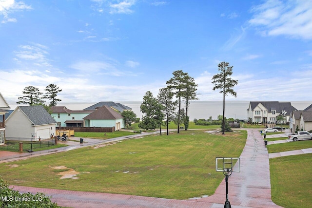 233 Arbor Trl, Brandon, MS 39047 - view of property's community featuring fence, a lawn, and a garage