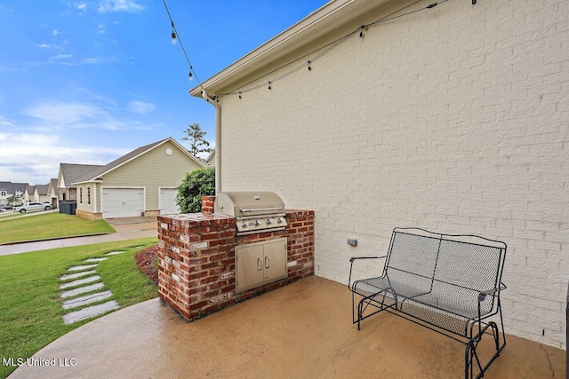 233 Arbor Trl, Brandon, MS 39047 - view of patio featuring exterior kitchen, an outbuilding, and a grill