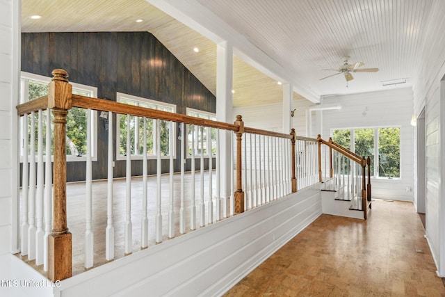 interior space featuring ceiling fan and vaulted ceiling