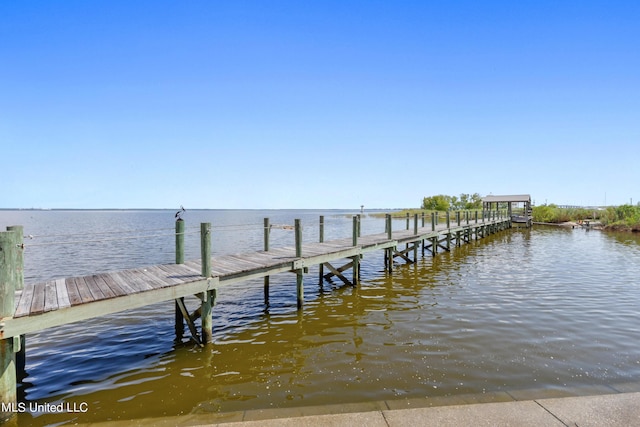 view of dock with a water view