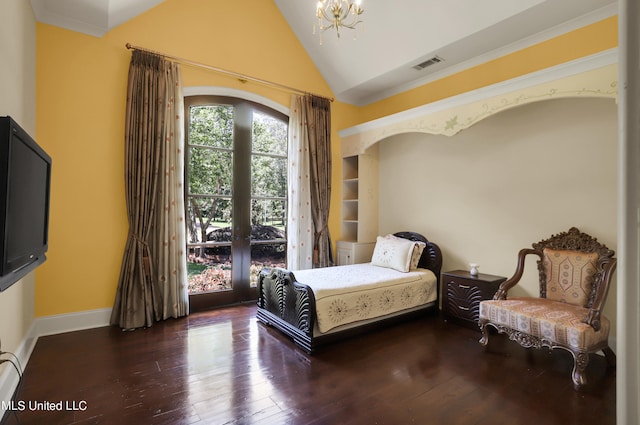 bedroom featuring vaulted ceiling, an inviting chandelier, and dark hardwood / wood-style flooring