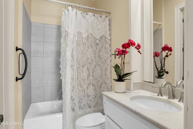 full bathroom featuring vanity, toilet, and shower / bath combo