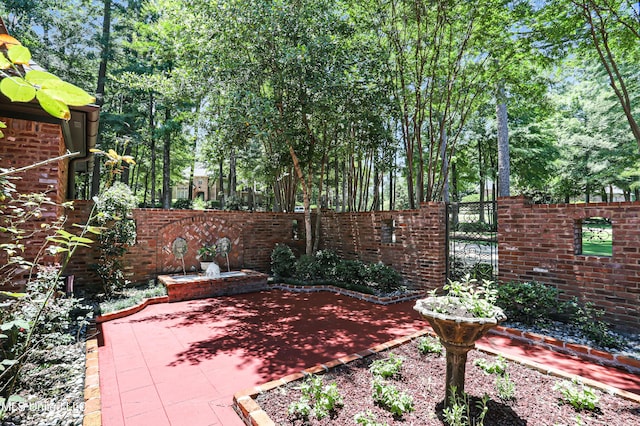 130 Bridgewater Xing, Ridgeland, MS 39157 - fenced backyard with a patio