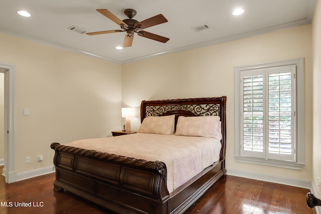 bedroom featuring crown molding, ceiling fan, and dark hardwood / wood-style flooring