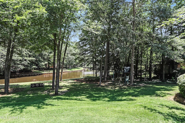 130 Bridgewater Xing, Ridgeland, MS 39157 - view of grassy yard with a water view