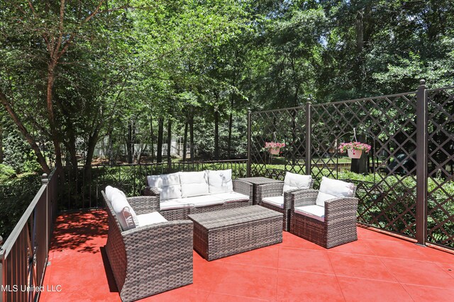 130 Bridgewater Xing, Ridgeland, MS 39157 - fenced backyard with an outdoor hangout area and a patio area