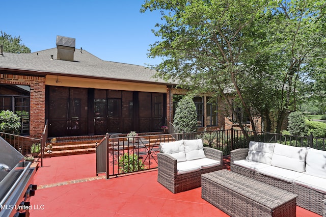 view of patio featuring an outdoor living space and a sunroom