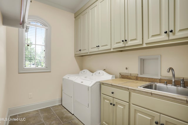 130 Bridgewater Xing, Ridgeland, MS 39157 - laundry room featuring cabinet space, separate washer and dryer, and baseboards