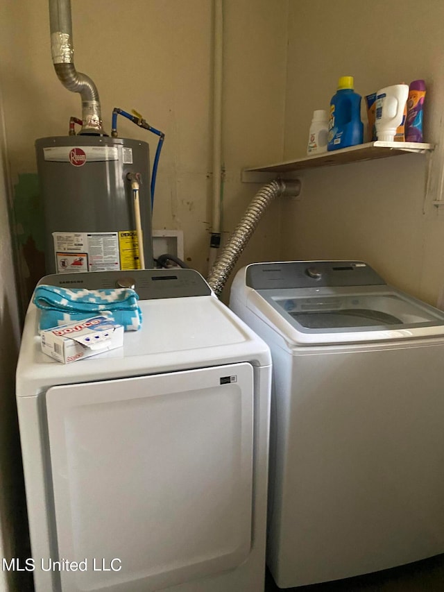 washroom featuring separate washer and dryer and water heater