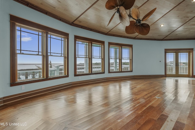 141 Janelle Dr, Bay Saint Louis, MS 39520 - empty room featuring wood ceiling, a ceiling fan, wood finished floors, and baseboards