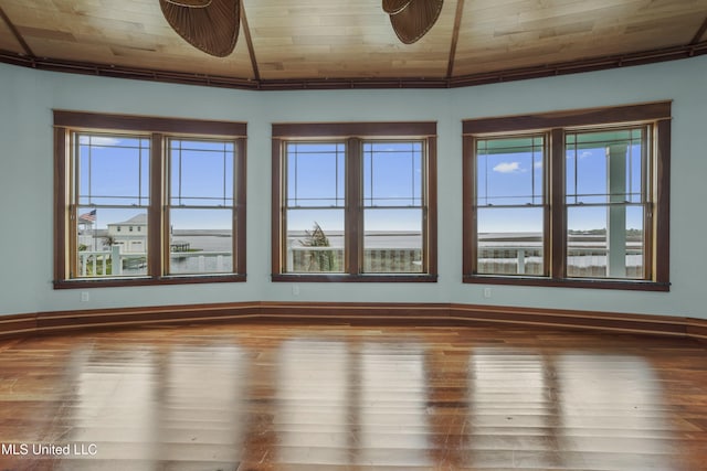 141 Janelle Dr, Bay Saint Louis, MS 39520 - empty room featuring wood finished floors, wooden ceiling, and baseboards