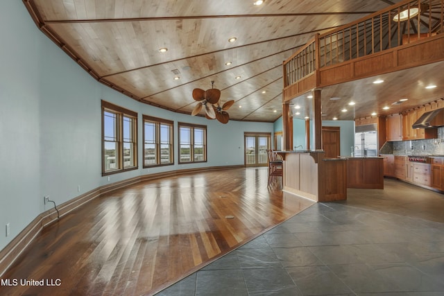 141 Janelle Dr, Bay Saint Louis, MS 39520 - unfurnished living room featuring wooden ceiling, a ceiling fan, baseboards, and recessed lighting
