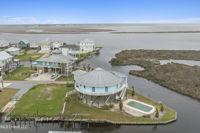 141 Janelle Dr, Bay Saint Louis, MS 39520 - bird's eye view of a nearby body of water and a pool