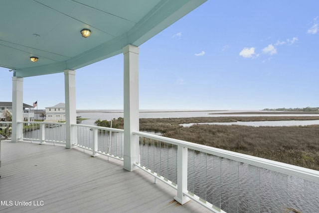 141 Janelle Dr, Bay Saint Louis, MS 39520 - wooden terrace with a water view
