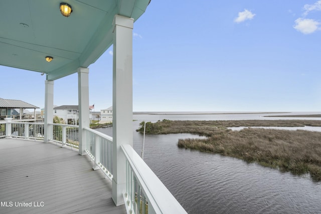 141 Janelle Dr, Bay Saint Louis, MS 39520 - wooden deck with a water view