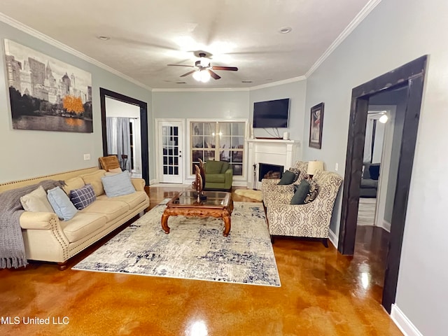 living room featuring ceiling fan and crown molding