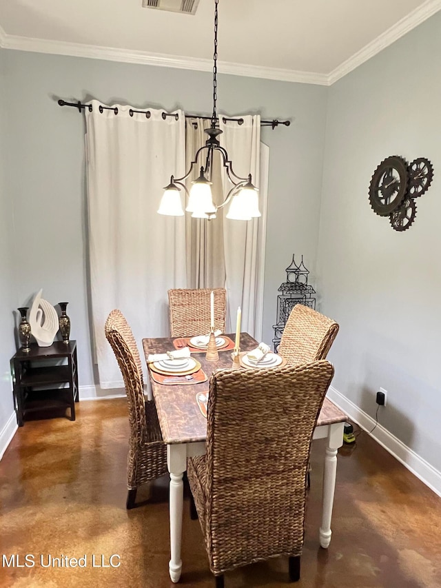 dining area featuring crown molding and an inviting chandelier