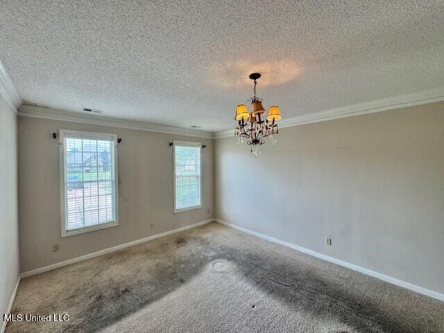 7428 Wallingford Dr, Olive Branch, MS 38654 - carpeted spare room featuring a chandelier, plenty of natural light, crown molding, a textured ceiling, and baseboards