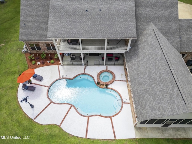 130 Pine Lake Cv, Flora, MS 39071 - pool featuring a lawn, a patio, and an in ground hot tub