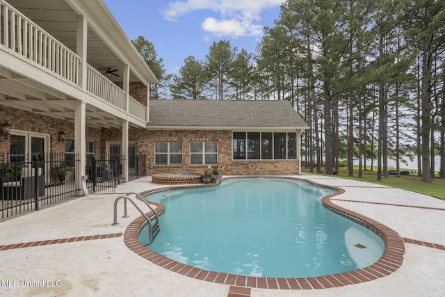 130 Pine Lake Cv, Flora, MS 39071 - outdoor pool featuring fence, a ceiling fan, and a patio area