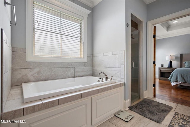 102 Hampton Chase, Madison, MS 39110 - ensuite bathroom with ornamental molding, a garden tub, a shower stall, and tile patterned floors