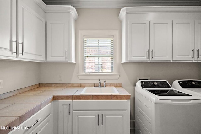 102 Hampton Chase, Madison, MS 39110 - washroom featuring cabinet space and washing machine and dryer