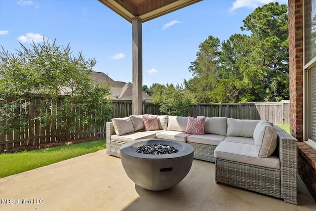 102 Hampton Chase, Madison, MS 39110 - fenced backyard featuring a patio area and an outdoor living space with a fire pit